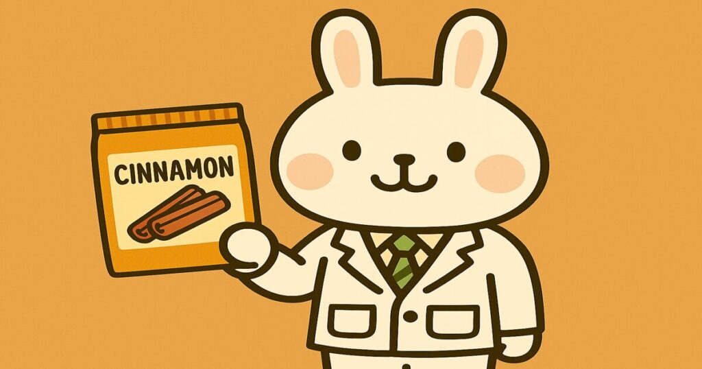 白衣姿のみどりんが、手にセイロンシナモンのパウダー商品を持ち、にっこりと紹介しているイラスト。背景は淡いグリーンで、商品紹介パートに適した明るく安心感のあるデザイン。